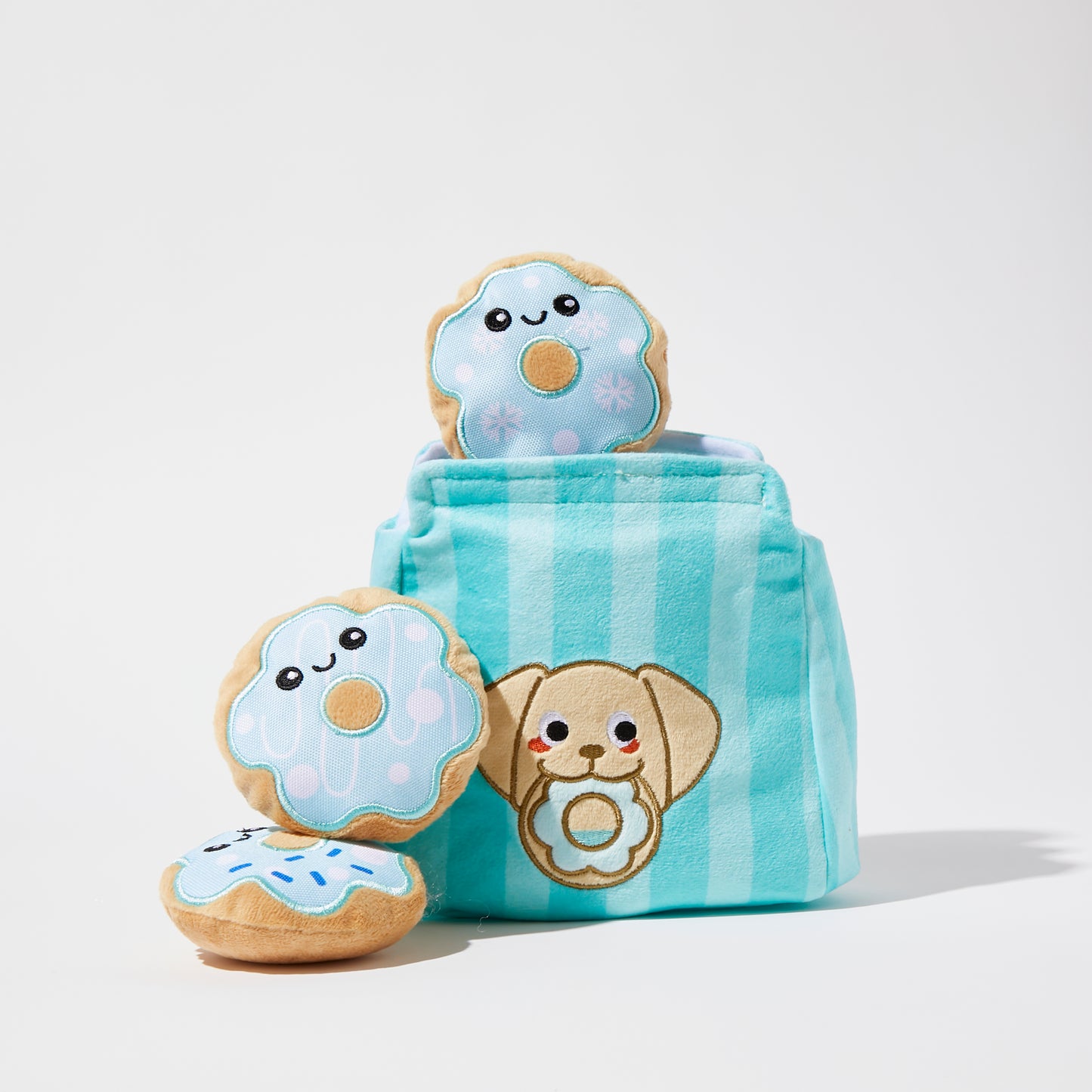 Peluche interactive en sachet de beignets hivernaux